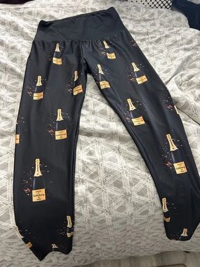 Goldsheep Black Leggings with Gold Champagne Bottle Motif
